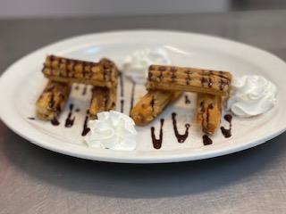 Delicious Mexican dessert with chocolate drizzle